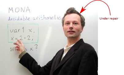 Nils Klarlund in front of whiteboard.